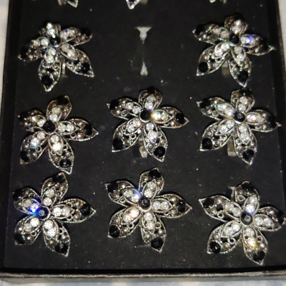 Adjustable rhinestone flower ring.  free If added to other item from closet